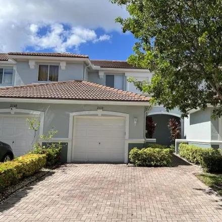 Rent this 3 bed house on 2106 Oakmont Drive in Riviera Beach, FL 33404