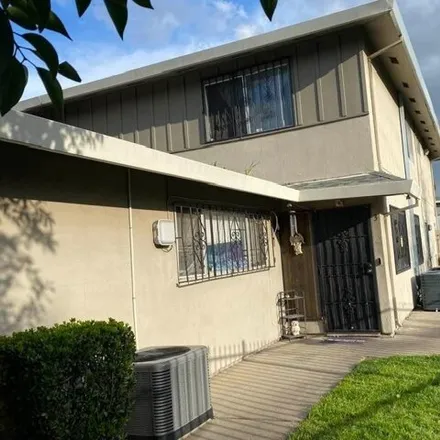 Buy this 2 bed townhouse on 402 East Bianchi Road in Akers, Stockton
