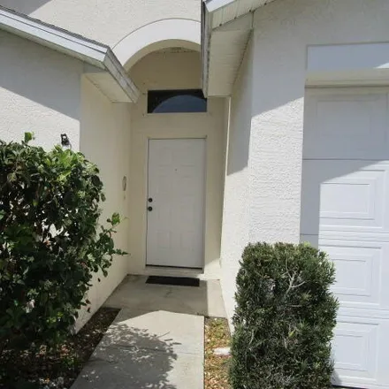 Rent this 3 bed house on 578 Creston Court in Melbourne, FL 32901