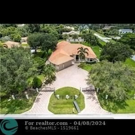 Buy this 5 bed house on 11369 Northwest 8th Street in Plantation, FL 33325