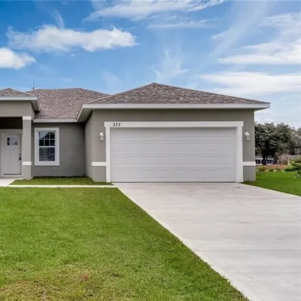 Rent this 4 bed house on 323 Edgewood Ct in Poinciana, Florida