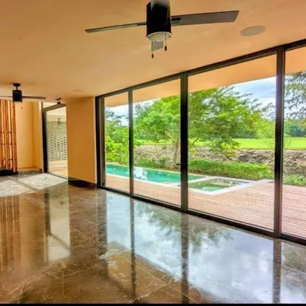 Rent this 4 bed house on Avenida Country Club in 97500 Yucatán Country Club, YUC