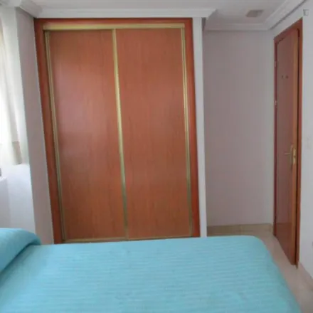 Rent this 2 bed room on Avenida del Planetario in 28045 Madrid, Spain
