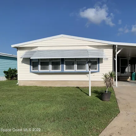 Buy this 2 bed house on 298 North Tamarind Circle in Micco, Brevard County