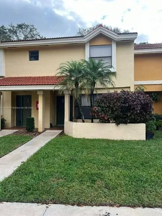 Buy this 2 bed house on Coral Tree Terrace in Coconut Creek, FL 33066