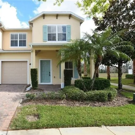 Buy this 4 bed townhouse on Park Commons Drive in Orange County, FL 32832