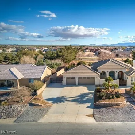 Buy this 3 bed house on 5249 Fieldstone Drive in Pahrump, NV 89061