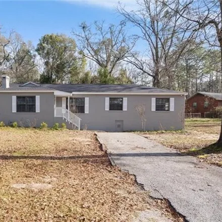 Buy this 4 bed house on 7122 East Lakeview Drive in Mobile County, AL 36695