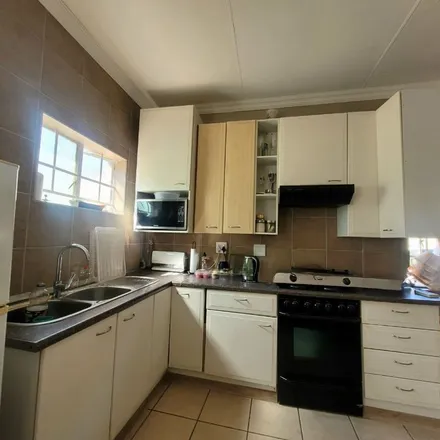 Rent this 2 bed townhouse on 2nd Avenue in Johannesburg Ward 70, Roodepoort