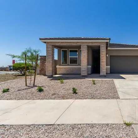 Rent this 4 bed house on 15543 West Desert Hollow Drive in Surprise, AZ 85387