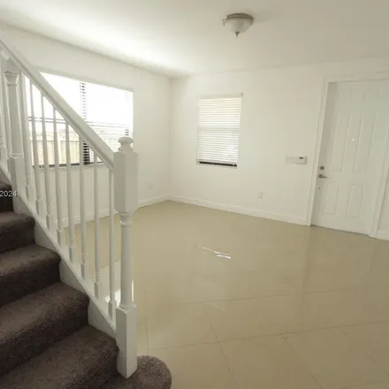 Rent this 4 bed apartment on 9948 Northwest 87th Terrace in Doral, FL 33178