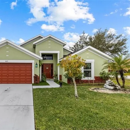 Buy this 5 bed house on 6566 Crescent Loop in Winter Haven, FL 33884