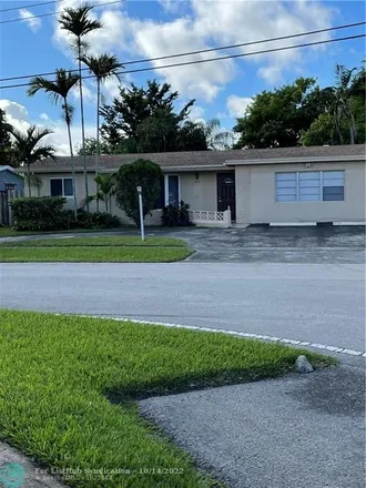 Buy this 4 bed house on 3247 Northwest 44th Terrace in Lauderdale Lakes, FL 33319