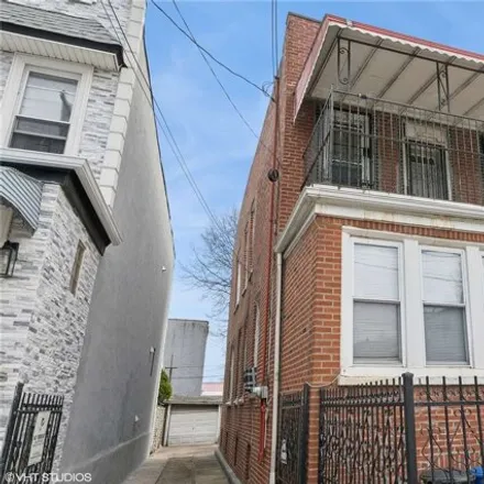 Buy this 6 bed house on 1102 Belmont Avenue in New York, NY 11208