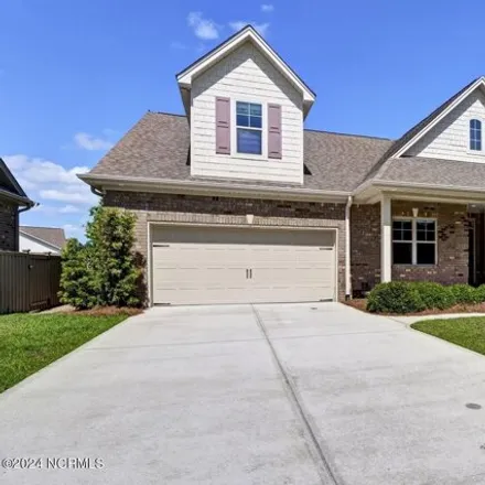 Buy this 4 bed house on 1313 Garden Springs Court in Leland, NC 28451