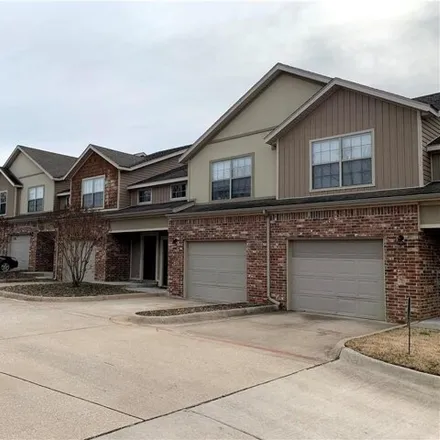 Rent this 3 bed townhouse on 1063 West Malibu Street in Fayetteville, AR 72703