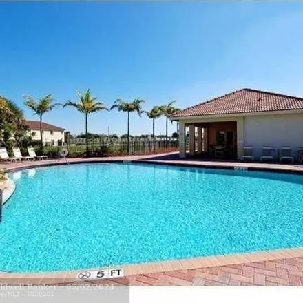 Rent this 3 bed apartment on Northwest 21st Terrace in Broward County, FL 33309