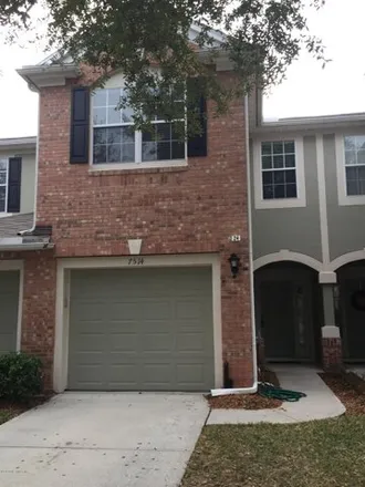 Rent this 3 bed house on 7514 Scarlet Ibis Lane in Jacksonville, FL 32256