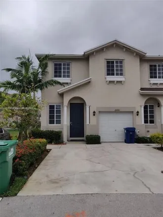 Rent this 3 bed townhouse on 21476 Northwest 14th Court in Miami Gardens, FL 33169