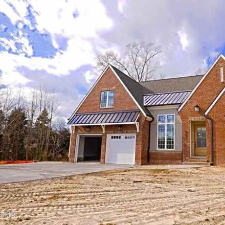 Buy this 4 bed house on 1085 Crystalwater Drive in Fuquay-Varina, NC 27526