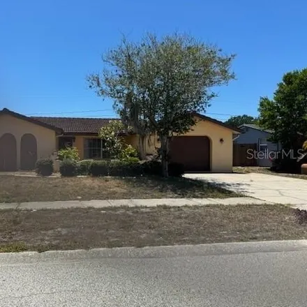 Rent this 2 bed house on 1097 Rushmore Drive in Holiday, FL 34690
