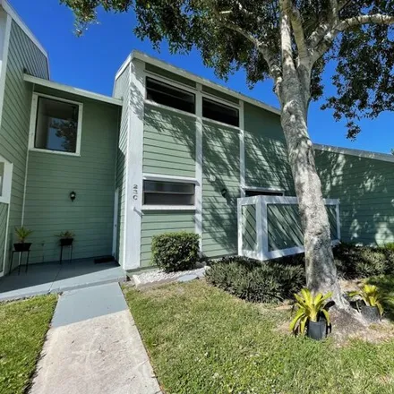 Rent this 2 bed townhouse on 554 Lakewood Drive in West Jupiter, Jupiter