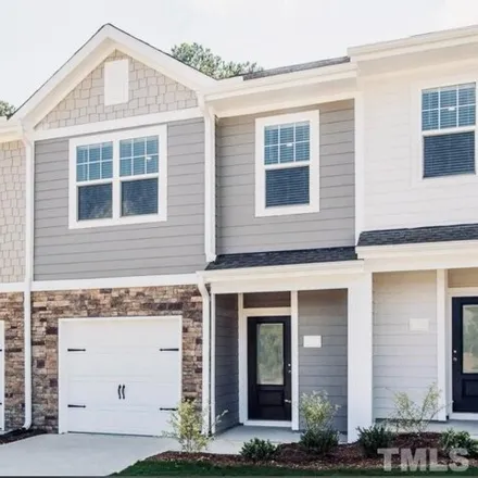 Rent this 3 bed townhouse on 5319 Thalweg Drive in Wake County, NC 27616