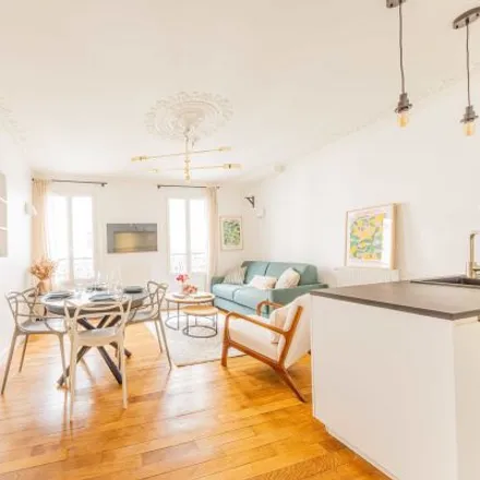 Rent this 4 bed apartment on 26 Rue Véron in 75018 Paris, France