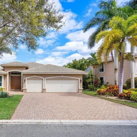 Buy this 4 bed house on 5809 54th Circle in Coral Springs, FL 33067