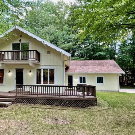 Buy this 3 bed house on 6801 Sugar Hill Lane in Otsego Lake Township, MI 49735