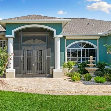 Buy this 4 bed house on Coral Oaks Golf Course in 1800 Northwest 28th Avenue, Cape Coral