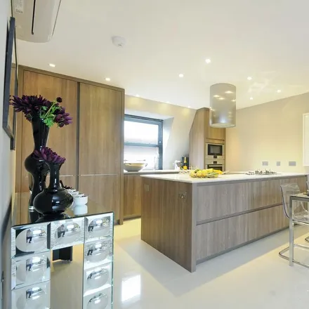 Rent this 4 bed apartment on Boydell Court in London, NW8 6NG