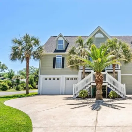 Buy this 6 bed house on 1002 South Poplar Drive in Surfside Beach, Horry County