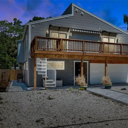 Buy this 4 bed house on 316 Ontario Avenue in Crystal Beach, Palm Harbor