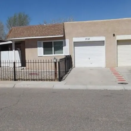Buy this 3 bed townhouse on 312 Garden Avenue Southwest in Los Lunas, NM 87031