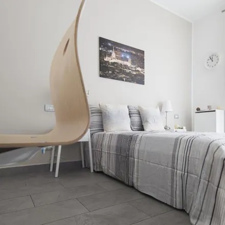 Rent this 4 bed room on Regina in Via Arbe, 71