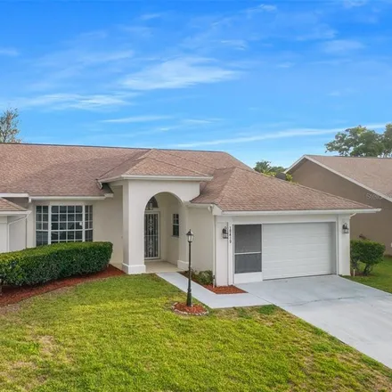 Buy this 3 bed house on 10410 Audie Brook Drive in Spring Hill, FL 34608