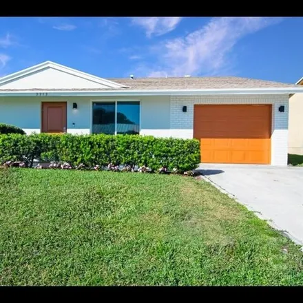Rent this 3 bed house on 2323 Avenue Z in Riviera Beach, FL 33404