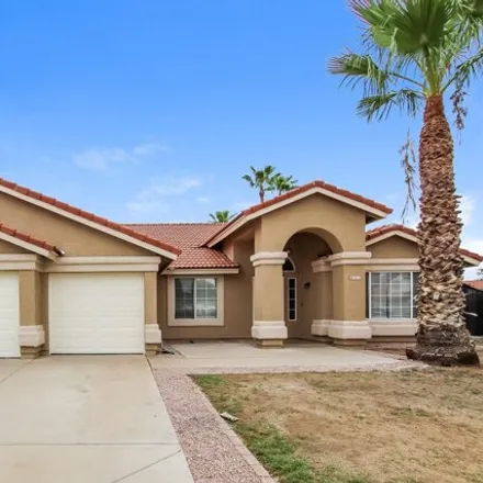 Rent this 4 bed house on 11421 West Emerald Lane in Avondale, AZ 85392