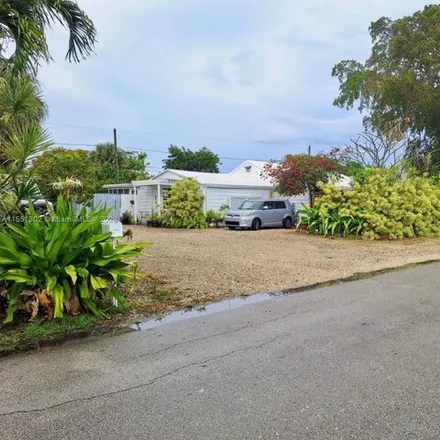 Buy this 5 bed house on 913 Northeast 17th Street in Fort Lauderdale, FL 33305