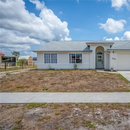 Buy this 3 bed house on 13346 Carter Ave in Port Charlotte, Florida