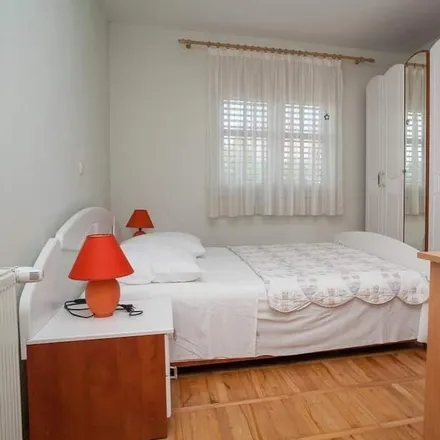 Rent this 1 bed apartment on 23206 Općina Sukošan