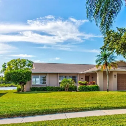 Buy this 4 bed house on 3008 Jackson Drive in Holiday, FL 34691
