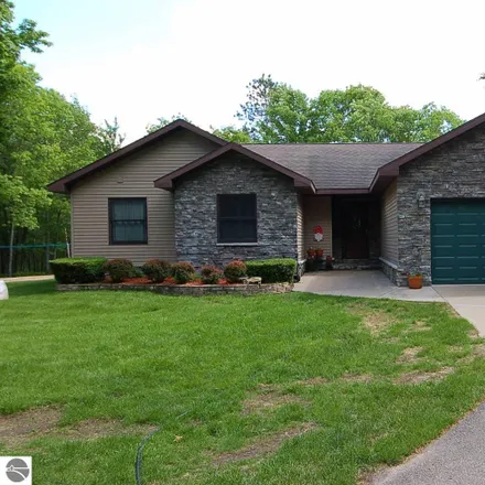 Buy this 5 bed house on 7681 Canthook Drive in Cedar Creek Township, MI 49663