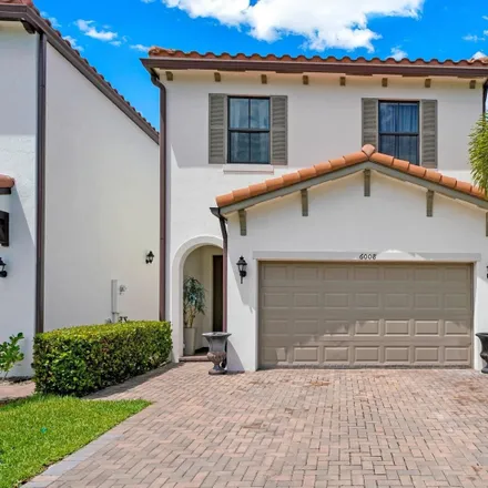 Buy this 3 bed house on 6610 Pine Tree Circle in Lake Clarke Shores, Palm Beach County