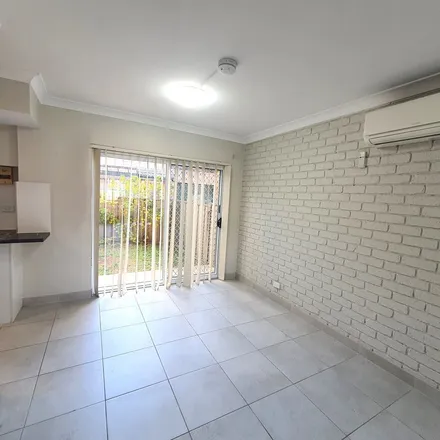 Rent this 3 bed townhouse on 33 Napier Avenue in Lurnea NSW 2170, Australia