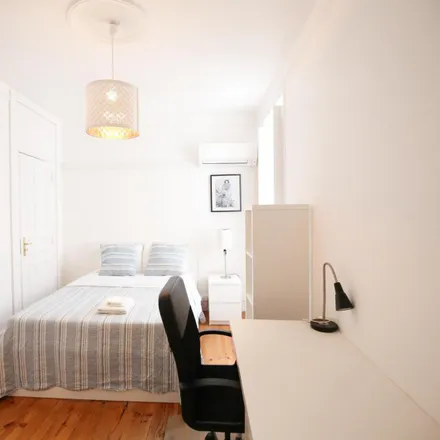 Rent this 5 bed room on Rua Quirino da Fonseca 8 in 1000-047 Lisbon, Portugal