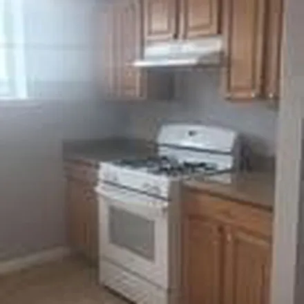 Rent this 3 bed apartment on 66-39 79th Place in New York, NY 11379