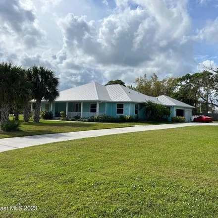 Rent this 3 bed house on 3427 Coquina Terrace in Malabar, Brevard County