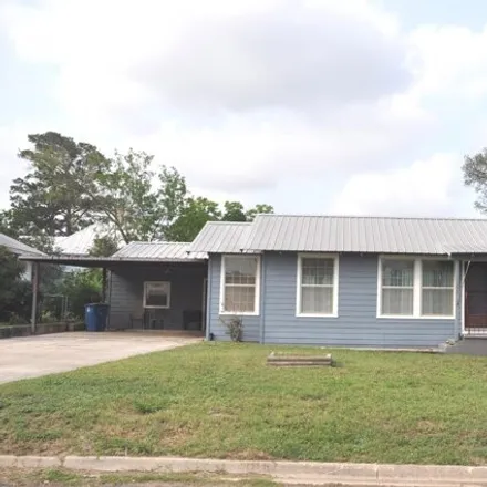Buy this 2 bed house on 308 W Moore Ave in Devine, Texas